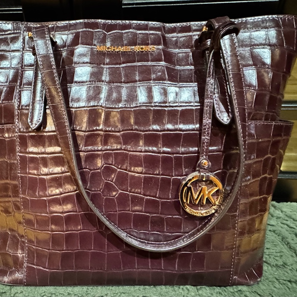 Michael Kors Brown Tote Bag with Gold Accents and Structured Design